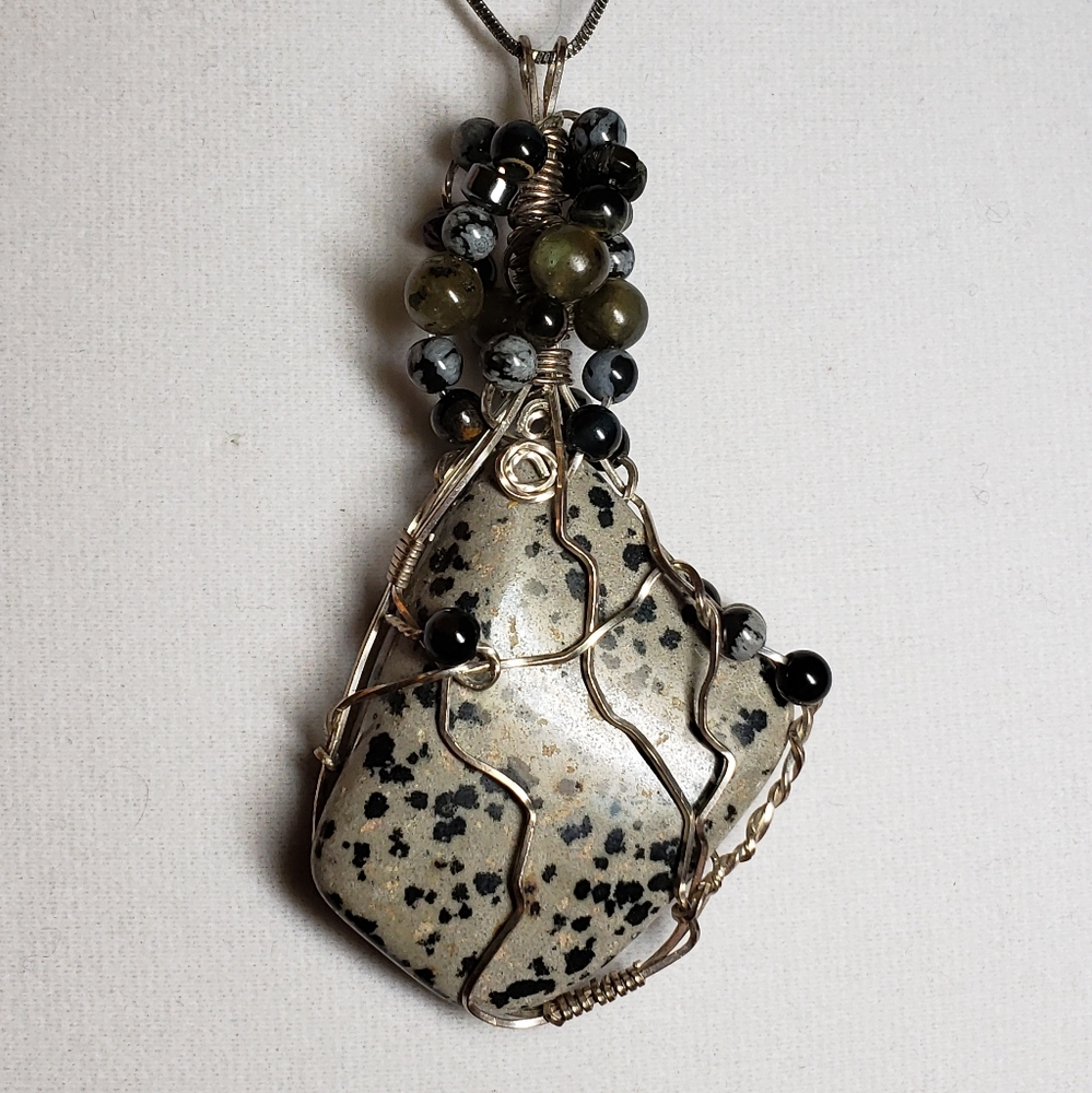 Artisan wire-wrapped Dalmatian stone